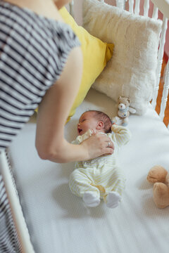 Mother Caressing Baby Girl