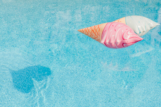 ice cream cone floats make a heart-shaped shadow