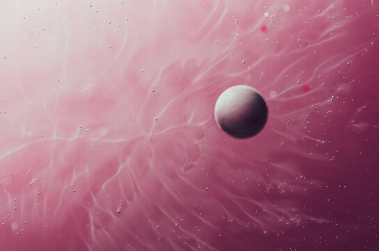 Abstract planet orbiting near nebula