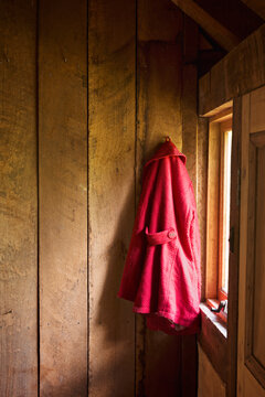 red coat on hook