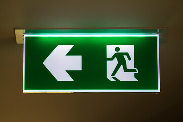 The safety green sign symbol for go to the fire exit.	
