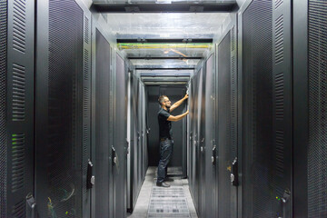 IT computer expert working on Network server