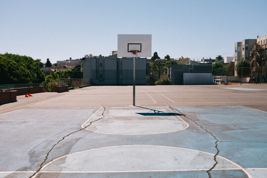 basketball court on playground in summer time