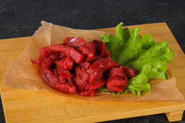 Raw beef meat sliced for cooking