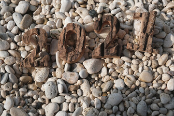 On the stones are the numbers 2021. New Year at sea.
