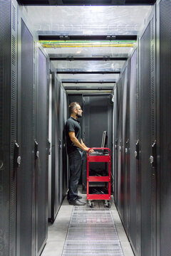 IT computer expert working on Network server