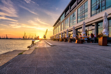 sunset in the city near the sea