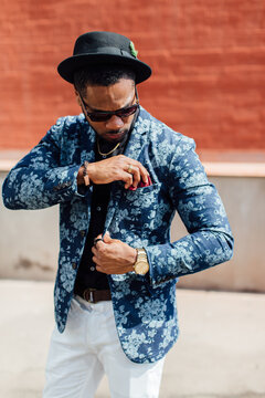 Handsome African American young businessman in a trendy dapper outfit