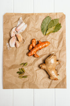 various spices on a paper grocery bag