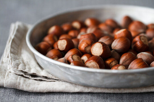 Hazelnuts on a metal plate