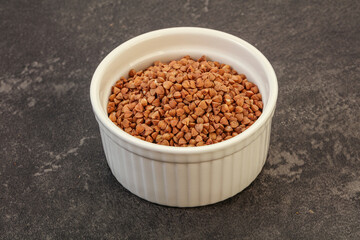Raw buсkwheat cereal in the bowl