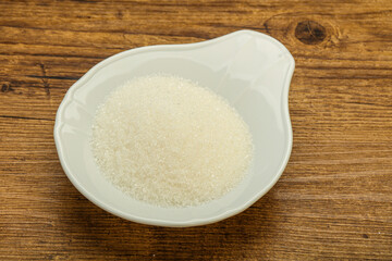 White sugar in the bowl