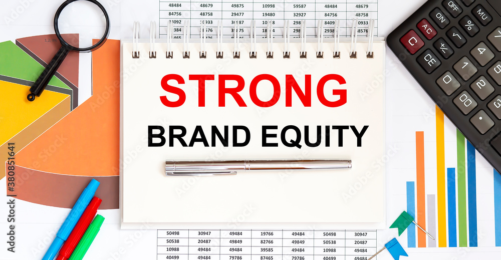 Poster notebook with tools , charts and notes with text strong brand equity