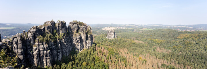 Fototapeta na wymiar Panoramic view on the schrammstein rocks in saxon switzerland. Saxony. Germany