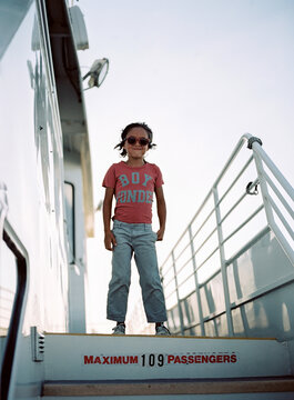 Boy wonder on ferry boat