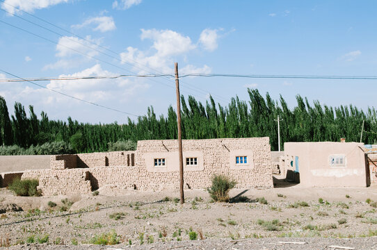 Mud brick home, west of Kashgar, China.