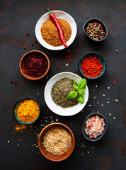 Various spices on a black background