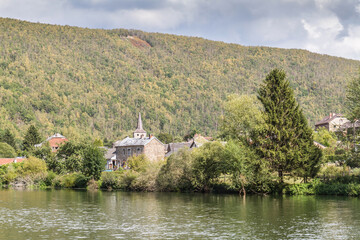 Obraz premium church in the village of the river