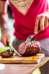 barbeque meat preparation in a summer day