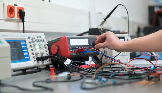 Young technican working in lab