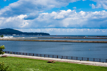 wide sky and blue sea seen from the park