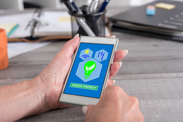 Green energy concept on a smartphone