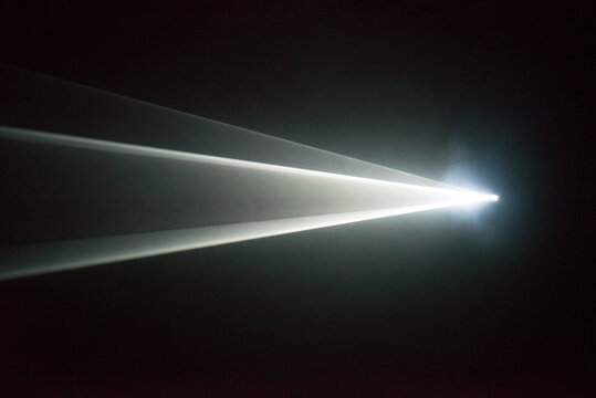 Illuminated beam of light from a projector