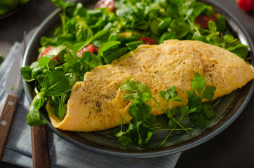 Egg omelette with salad