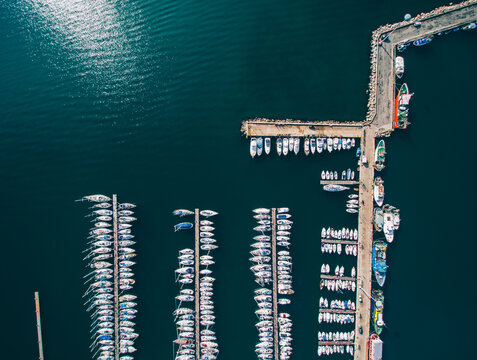 Aerial view of boats docked in a marina.