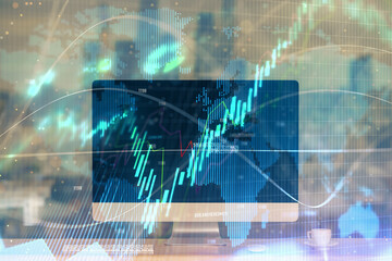 Forex market graph hologram and personal computer on background. Double exposure. Concept of investment.