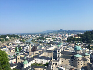 Obraz premium View of the old town and the Salzach river, seen from mountain in Salzburg, Austria 