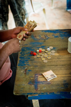 Side view of man holding money