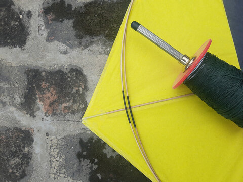 Indian kites and spool used in the very popular sport of kite fighting. These are traditionally used on Makar Sankranti or Independence day