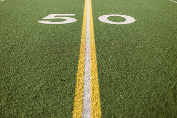 Fifty Yard Line Marked On Turf Football Field