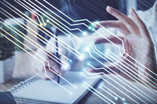 Multi exposure of writing hands on background with data solution hologram. Technology concept.