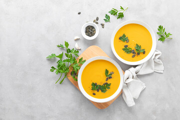 Vegan pumpkin soup with garlic and parsley - Powered by Adobe
