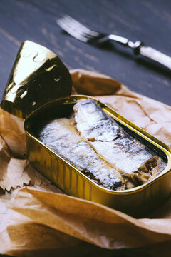 Sardines in a tin on table