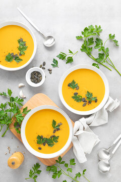 Vegan pumpkin soup with garlic and parsley