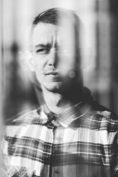 Portrait of an young man with plaid shirt