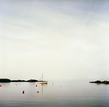 ealing boat in a cove in Wales