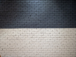 Brick wall painted white and black
