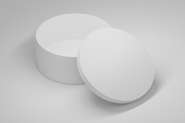 Two round white boxes with blank white surfaces on white background