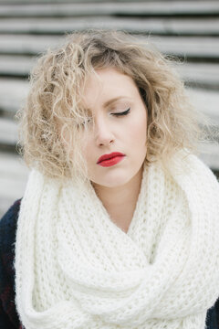 Portrait of a young beautiful curl model in winter clothes