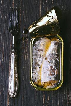 Sardines in a tin on table