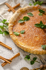 Caramel tart with mint and cinnamon