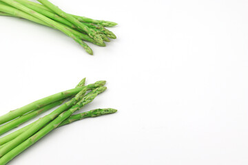 Green asparagus on a white background