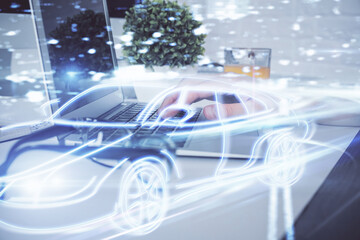 Fototapeta premium Automobile theme drawing with businessman working on computer on background. Autopilot taxi concept. Double exposure.