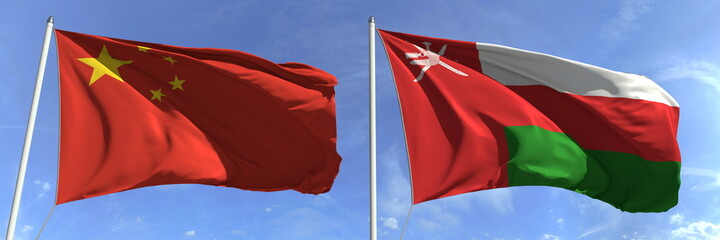 Waving flags of China and Oman on flagpoles, 3d rendering