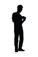 Standing man with phone silhouette vector