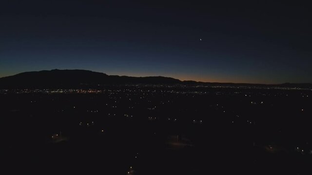 Sunrise shot of the Sandia Mountains and Albuquerque, NM.